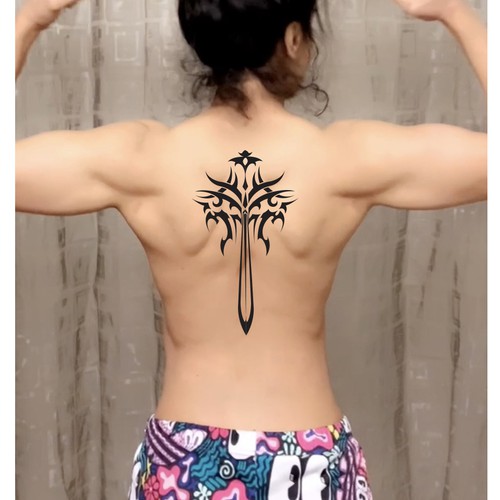 Back sword tatto, represents power, warrior's sword, with a dragon face on the circle of the swords handle Design by RadeM