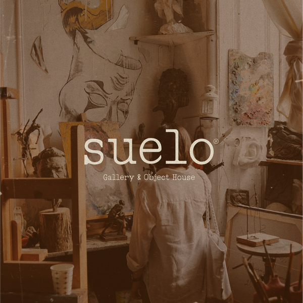The rustic logo for Suelo