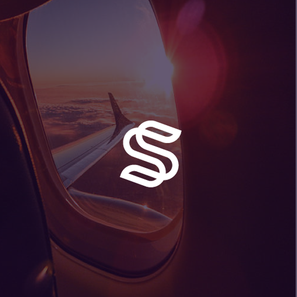 a modern logo for a new luxury travel agency