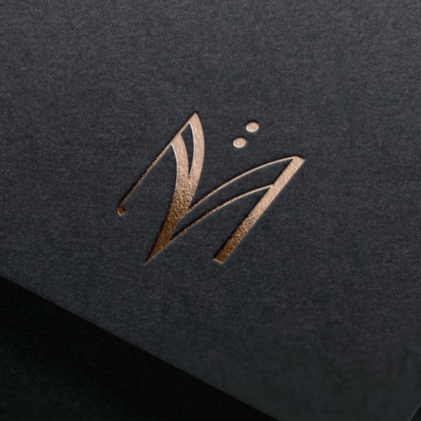 Design by KD Berlin titled "Art Déco luxury style unique logo with an Umlaut for an Apt. Building Brand in Omaha"