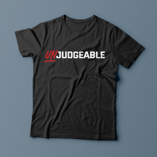 Simple t shirt design for media/ marketing for brand “Unjudgeable” Design by magnificent 7&co