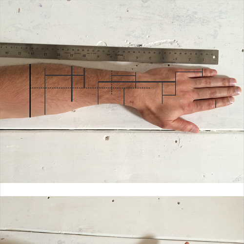 Design a functional tattoo for Ben Uyeda that turns his arm into a ruler Design by wanbe