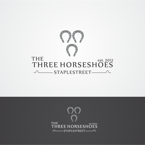 logo for Three Horseshoes Design by zetaxc