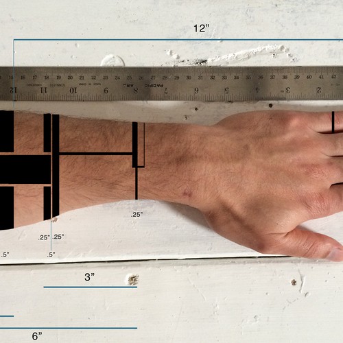 Design a functional tattoo for Ben Uyeda that turns his arm into a ruler Design by ayang5525