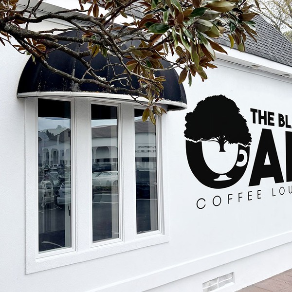 Logo concept with an Oak Tree and a Coffee Cup