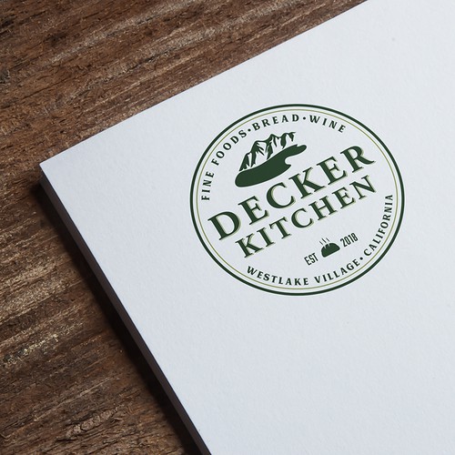 Create a rustic artisan logo for Decker Kitchen Design by Graphema Digital