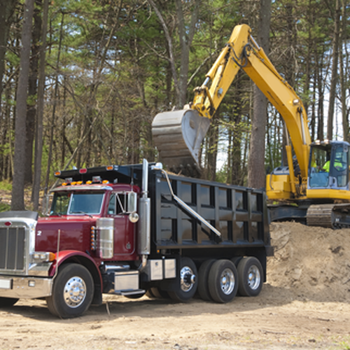 AdobeStock_loading-a-dump-truck.png