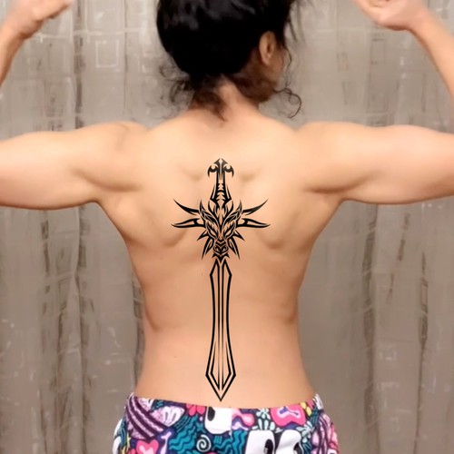 Back sword tatto, represents power, warrior's sword, with a dragon face on the circle of the swords handle Design by DeeHarrison✅