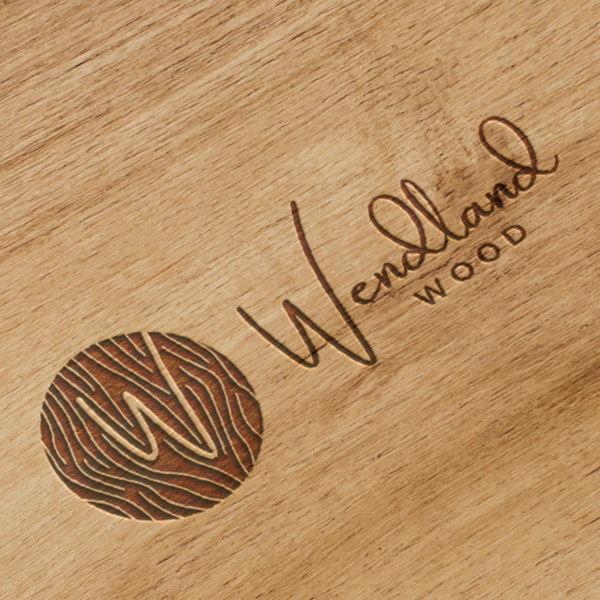 Design by fire.design titled "Modern/elegant logo for unforgettable wooden furniture made from local woods"