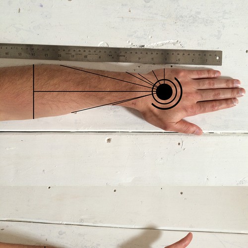 Design a functional tattoo for Ben Uyeda that turns his arm into a ruler Design by wanbe